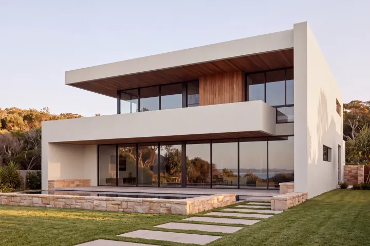 The home with every rendered wall in Colorbond Surfmist, a soft off-white.