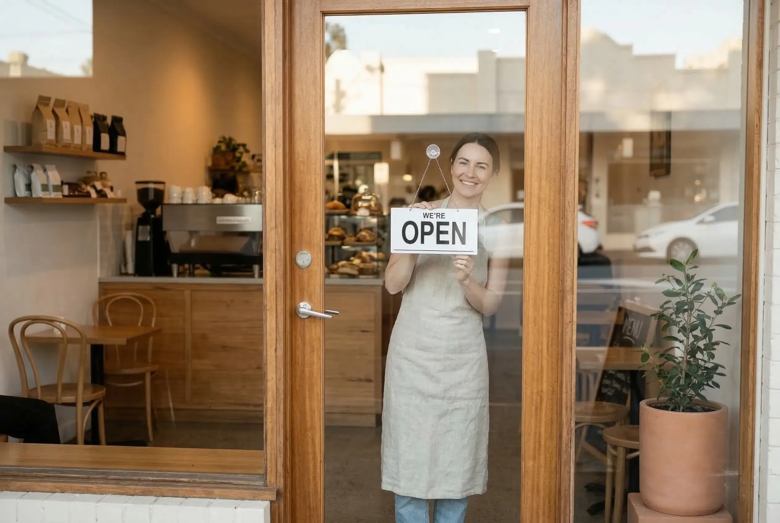 Small business owner in an open field representing the opportunity ahead