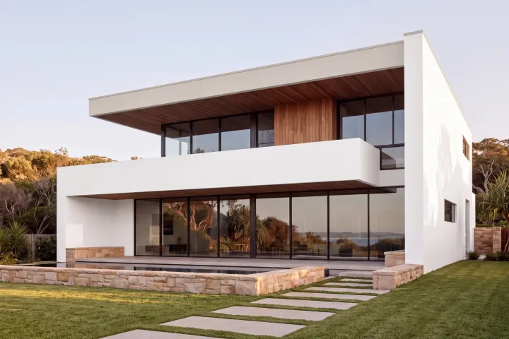The home in Dulux Vivid White with the roof slab edge in Feather Soft.